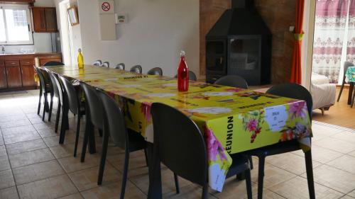 a table with a colorful table cloth on it at L'Idolivier in La Plaine des Palmistes