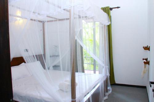 Ένα ή περισσότερα κρεβάτια σε δωμάτιο στο SunMoon villa