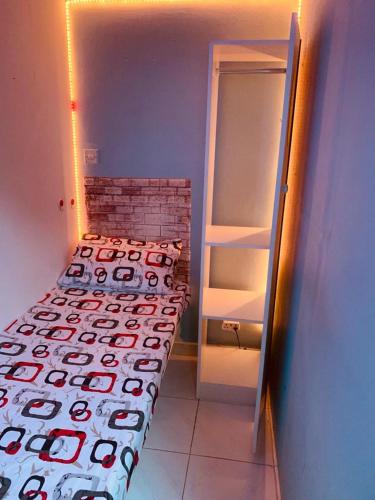 Ένα ή περισσότερα κρεβάτια σε δωμάτιο στο Bright Homes 1