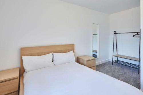 Postel nebo postele na pokoji v ubytování Zetland House Apartment 6 Loftus