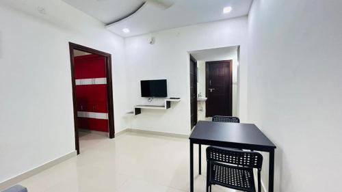 TV a/nebo společenská místnost v ubytování Abode Stayz Service Apartments