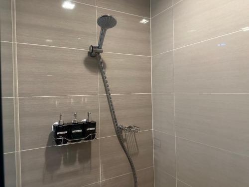 Koupelna v ubytování Deluxe Suite in One Uptown, BGC with Mall Fountain View