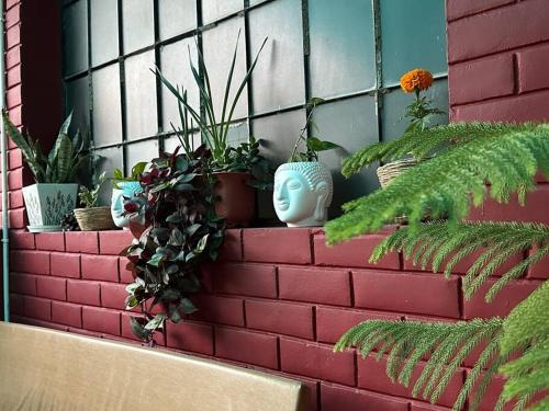 Aikyam Niwas - 1BHK Apartmentにある庭