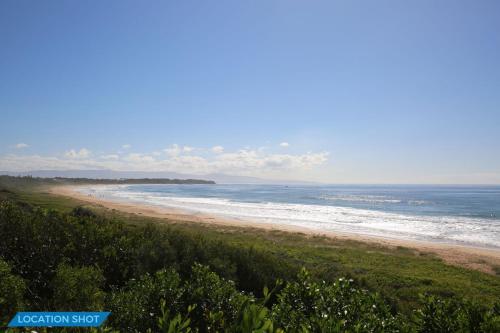 a view of a beach with the ocean at The Relax Shack - Pet Friendly - 8 Mins Walk to Beach in Culburra Beach