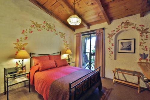 Una cama o camas en una habitación de Hotel Villas Casa Morada
