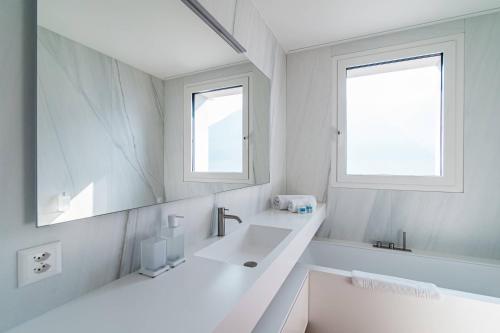 Koupelna v ubytování Unique Gandria 3 by Quokka 360 - luxury two-bedroom apartment with a breathtaking view