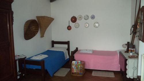 A bed or beds in a room at B&B Gli Eremiti