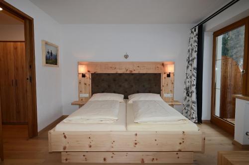 Кровать или кровати в номере Apartment Loisach
