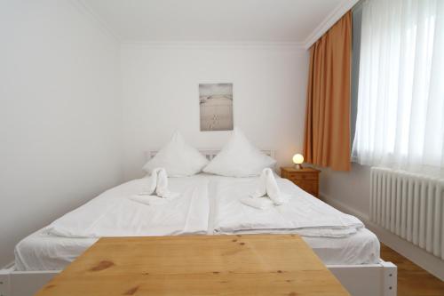 Postel nebo postele na pokoji v ubytování Haus Sarah App 1