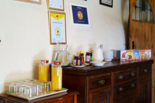 a wooden table with a blender on top of it at Yallands Farmhouse in Taunton