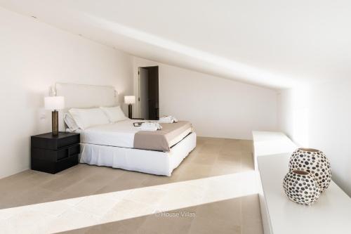 Ένα ή περισσότερα κρεβάτια σε δωμάτιο στο Villa DeMar