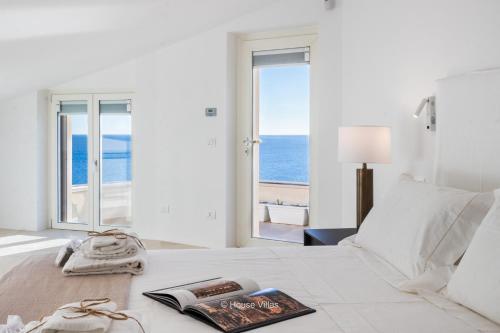 Ένα ή περισσότερα κρεβάτια σε δωμάτιο στο Villa DeMar