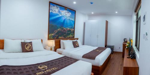 Giường trong phòng chung tại Big Hotel Lào Cai