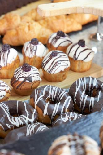 a bunch of donuts with chocolate and marshmallows at True Beach Resort in Marsa Alam City