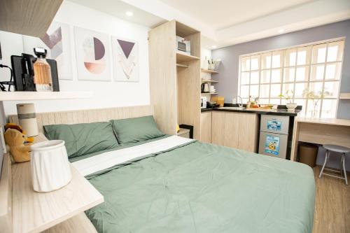 Llit o llits en una habitació de 101 - Homestay chill in the center of Sai Gon