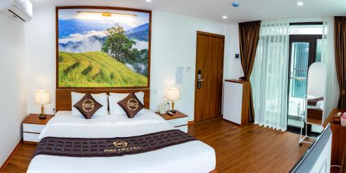 Een bed of bedden in een kamer bij Big Hotel Lào Cai