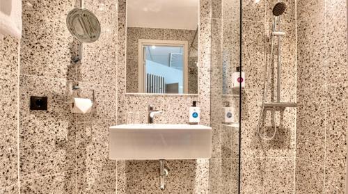 Ванная комната в Quality Hotel Arlanda XPO