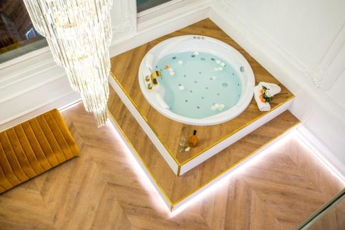 a room with a dog in a bowl on the floor at TOP Luxury Suites in Budapest