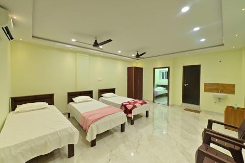 Katil atau katil-katil dalam bilik di Gokula Homestay