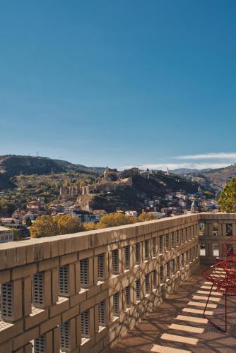 a view of the city from the top of a building at Sandali Metekhi Boutique Hotel in Tbilisi City