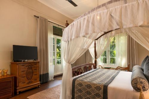 Katil atau katil-katil dalam bilik di Castle Hill Bungalow by Seven Angels