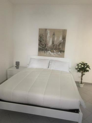 Ліжко або ліжка в номері La casa di Gio'