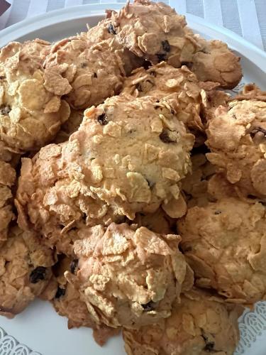 a pile of cookies on a plate on a table at Santa Maria Degli Ancillotti in Petrignano
