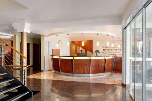 The lobby or reception area at Amedia Frankfurt Russelsheim Trademark Collection by Wyndham