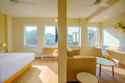 Postel nebo postele na pokoji v ubytování Bloom Hotel - GK2