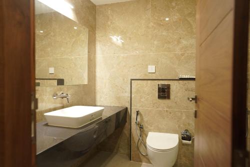 Koupelna v ubytování HOTEL VKJ INN Aluva