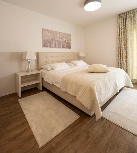 Postel nebo postele na pokoji v ubytování Hotel Magdalena