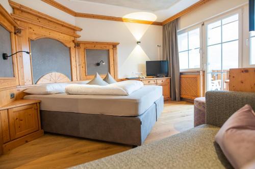 Katil atau katil-katil dalam bilik di Panorama Hotel Himmelreich