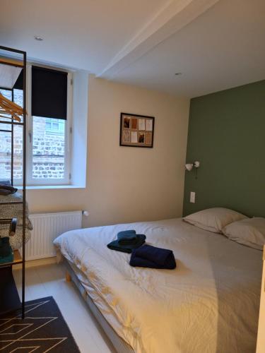 Posteľ alebo postele v izbe v ubytovaní APPARTEMENT LE PHARE AU PIED DU PORT