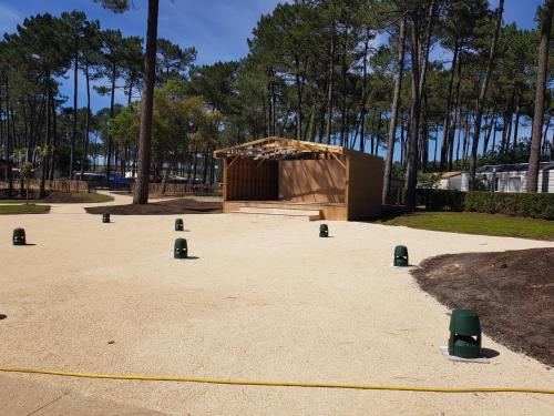 a building with a tent in a park at les dunes de contis in Saint-Julien-en-Born