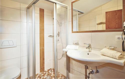 a bathroom with a sink and a shower at Awesome Apartment In Flachau With Kitchen in Flachau