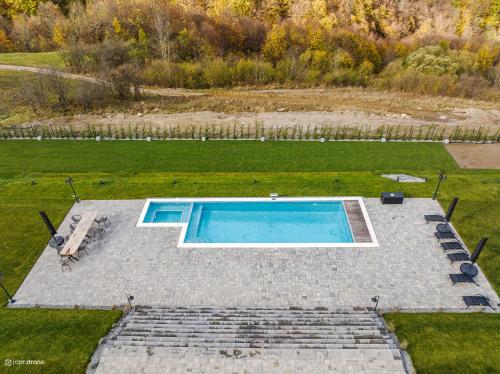 an overhead view of a swimming pool in a yard at Cabana Friends 