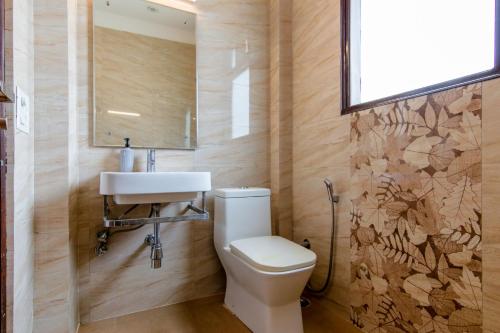 Koupelna v ubytování Hotel A4U sector 45 Gurgaon