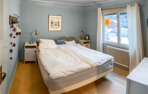 Katil atau katil-katil dalam bilik di Awesome Home In Hverud With Kitchen