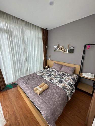 Posteľ alebo postele v izbe v ubytovaní Villa Jasmine Batu