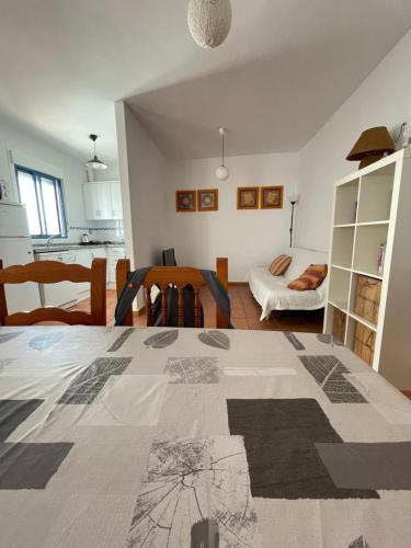 A bed or beds in a room at La Rosada 9