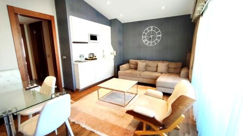 a living room with a couch and a table at Old Port Hotel in Istanbul
