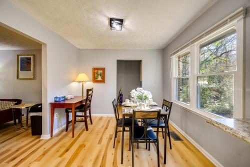 a dining room and living room with a table and chairs at Lovely Forsyth Home about 2 Mi to Tift College! in Forsyth