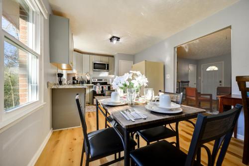 a kitchen and dining room with a table and chairs at Lovely Forsyth Home about 2 Mi to Tift College! in Forsyth