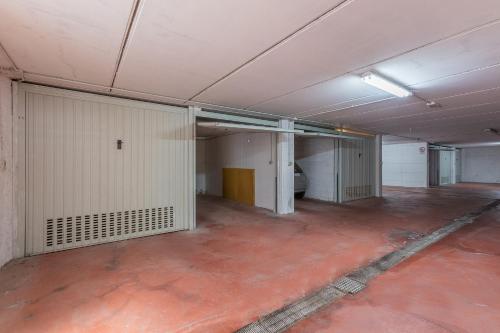 an empty room with white stalls in a building at Dimora Storica Manfredini nel cuore di Ferrara in Ferrara