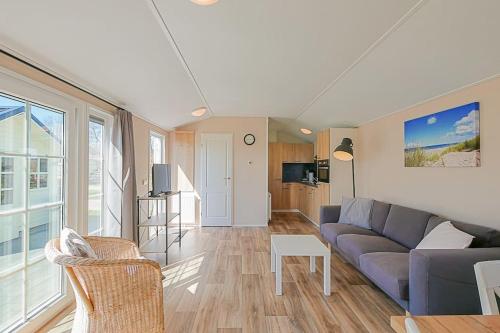 TV a/nebo společenská místnost v ubytování Chalet Luttikduin Nr 15 - Callantsoog aan Zee