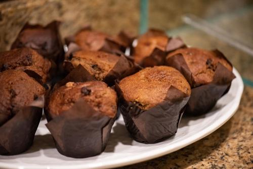 a plate of chocolate muffins on a table at Hilton Milwaukee in Milwaukee