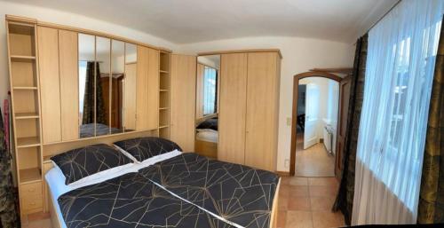 Postel nebo postele na pokoji v ubytování Wohnung 5 mit Garten und sonniger Terrasse