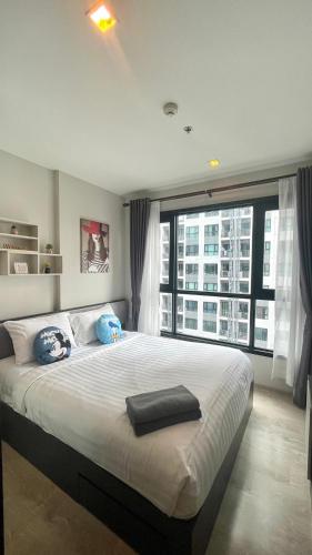 Кровать или кровати в номере The base Central Pattaya 975 by Numam