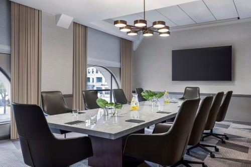 a conference room with a long table and chairs at Kimpton Hotel Monaco Salt Lake City by IHG in Salt Lake City