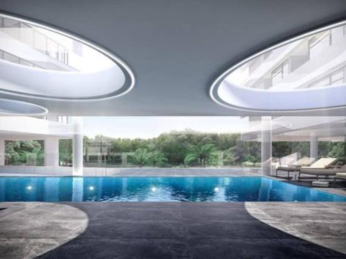 a rendering of a building with a swimming pool at Riverview Parkhouse Abbotsford in Melbourne